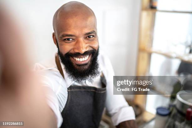 barista taking a selfie at work - african pov stock pictures, royalty-free photos & images