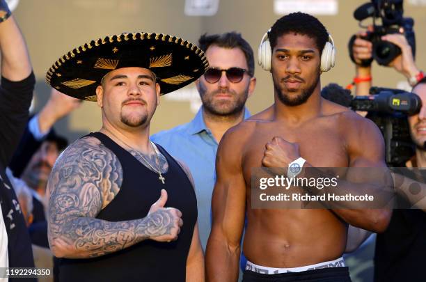 Andy Ruiz Jr and Anthony Joshua pose for photos after weighing in ahead of the IBF, WBA, WBO & IBO World Heavyweight Title Fight between Andy Ruiz Jr...