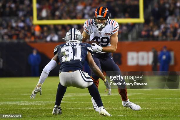 Jesper Horsted of the Chicago Bears is pursued by Byron Jones of the Dallas Cowboys during a game at Soldier Field on December 05, 2019 in Chicago,...