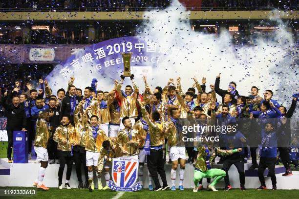 Players of Shanghai Greenland Shenhua celebrate with champion trophy after winning 2019 Chinese Football Association Cup final match between Shanghai...