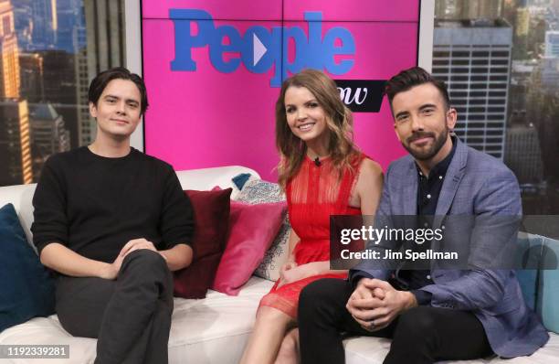 Actor/musician Miles Robbins, hosts Andrea Boehlke and Jeremy Parsons visit People Now on December 06, 2019 in New York, United States.