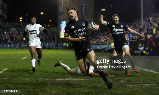 Rhys Priestland of Bath breaks clear to score the first try during the Heineken Champions Cup Round 3 match between Bath Rugby and ASM Clermont...