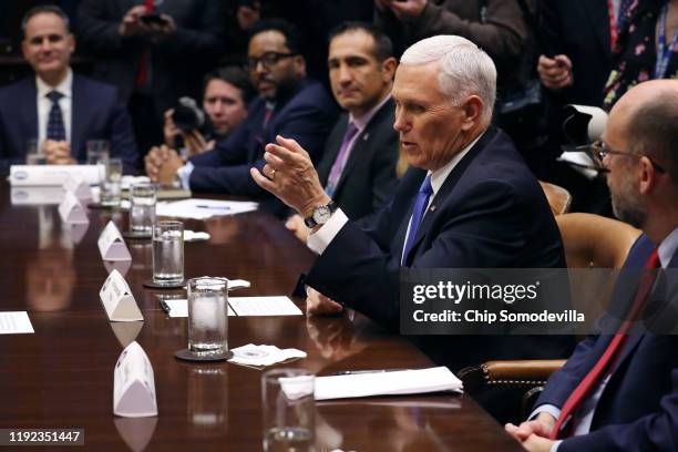 Vice President Mike Pence introduces small business owners invited to participate in a roundtable discussion with members of President Donald Trump's...