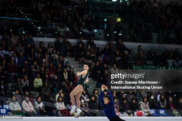 Wenjing Sui and Cong Han of China compete in the Pairs Free Skating during the ISU Grand Prix of Figure Skating Final at Palavela Arena on December...