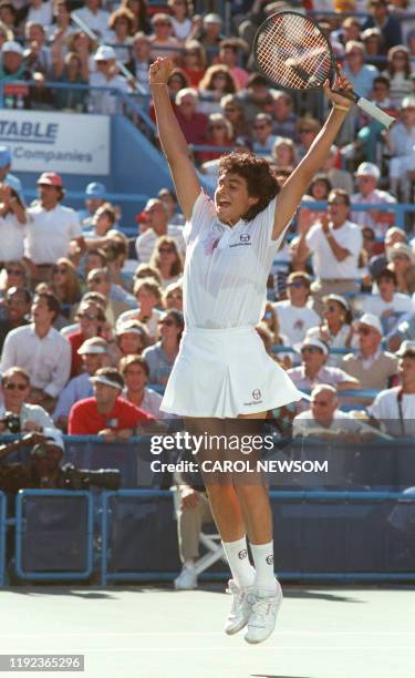 Argentinian tennis player Gabriela Sabatini jubilates after defeating German Steffi Graf in the Women's US Open final match at Flushing Meadow on...