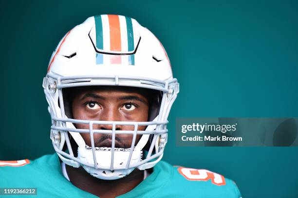 Taco Charlton of the Miami Dolphins looks on prior to the game against the Philadelphia Eagles at Hard Rock Stadium on December 01, 2019 in Miami,...