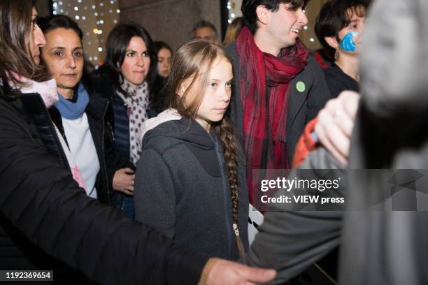 Greta Thunberg, surrounded by other activists, heads towards of the Climate March on December 6, 2019 in Madrid, Spain. Shortly after reaching the...