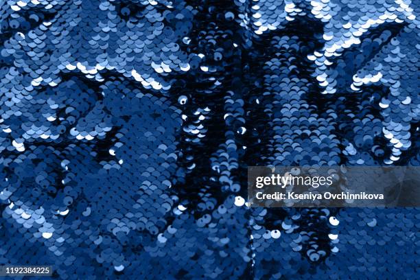 smooth elegant blue silk can use as background - sequin stock pictures, royalty-free photos & images