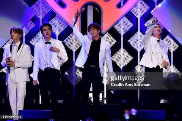 Suga, Jin, Jungkook, and RM of BTS perform onstage during KIIS FM's Jingle Ball 2019 presented by Capital One at The Forum on December 06, 2019 in...