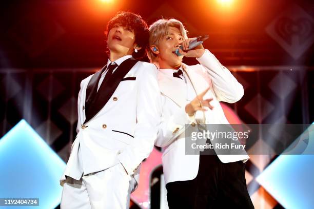 And RM of BTS perform onstage during 102.7 KIIS FM's Jingle Ball 2019 Presented by Capital One at the Forum on December 6, 2019 in Los Angeles,...