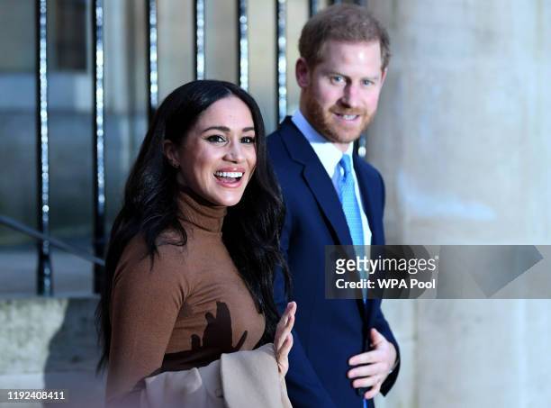 Prince Harry, Duke of Sussex and Meghan, Duchess of Sussex react after their visit to Canada House in thanks for the warm Canadian hospitality and...