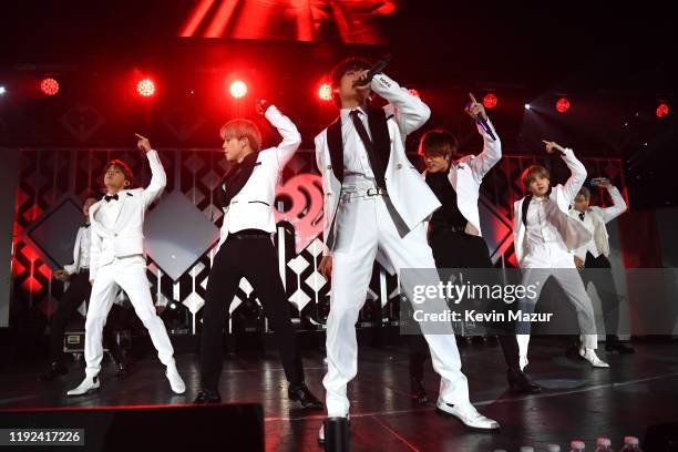 Jin, J-Hope, Jimin, V, Jungkook, Suga, and RM of BTS perform onstage during 102.7 KIIS FM's Jingle Ball 2019 Presented by Capital One at the Forum on...