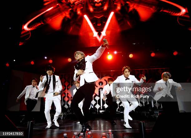 Jin, V, Jimin, J-Hope, and RM of BTS perform onstage during 102.7 KIIS FM's Jingle Ball 2019 Presented by Capital One at the Forum on December 6,...
