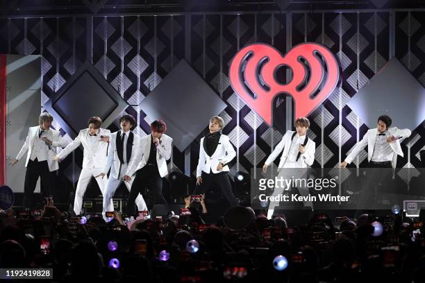 Hope, V, Suga, Jungkook, Jimin, and V of BTS perform onstage during 102.7 KIIS FM's Jingle Ball 2019 Presented by Capital One at the Forum on...