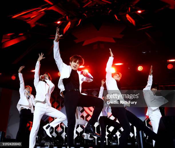 Hope, Suga , Jung Kook , Jin , Jimin, V. Of BTS perform onstage during 102.7 KIIS FM's Jingle Ball 2019 Presented by Capital One at the Forum on...