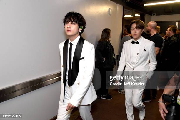 Suga and V of BTS attend 102.7 KIIS FM's Jingle Ball 2019 Presented by Capital One at the Forum on December 6, 2019 in Los Angeles, California.