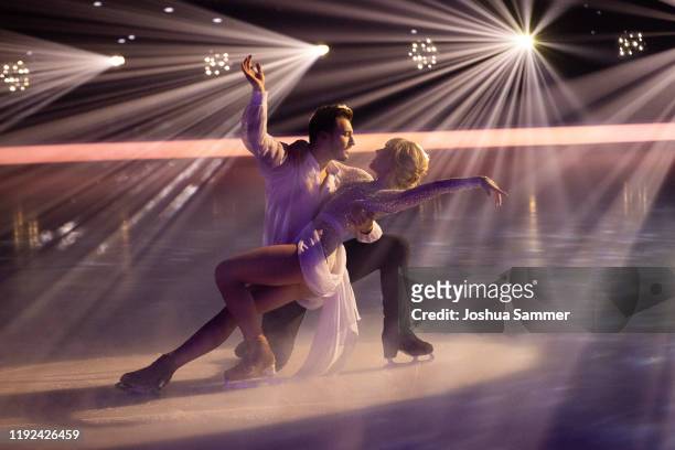 Lina Larissa Strahl and Joti Polizoakis perform during the 5th show of the TV series "Dancing on Ice" on December 06, 2019 in Cologne, Germany.