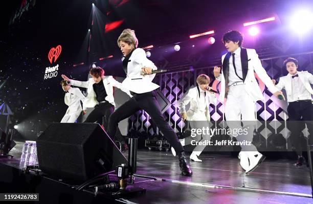 Hope, Jungkook, Jimin, Suga, and V of BTS perform onstage during 102.7 KIIS FM's Jingle Ball 2019 Presented by Capital One at the Forum on December...