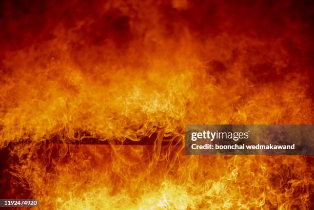 blaze fire flame texture background - inferno stock-fotos und bilder