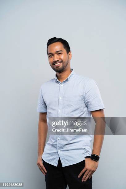 portrait of a successful malay muslim man - islam man stock pictures, royalty-free photos & images