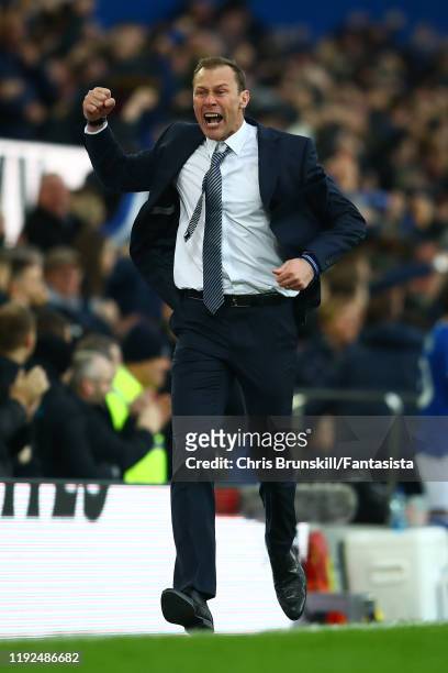 Everton manager Duncan Ferguson celebrates his side's third goal during the Premier League match between Everton FC and Chelsea FC at Goodison Park...