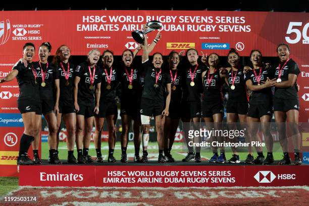 Players of New Zealand celebrate after winning the Women's Cup Final match between New Zealand and Canada on Day Three of the the HSBC World Rugby...