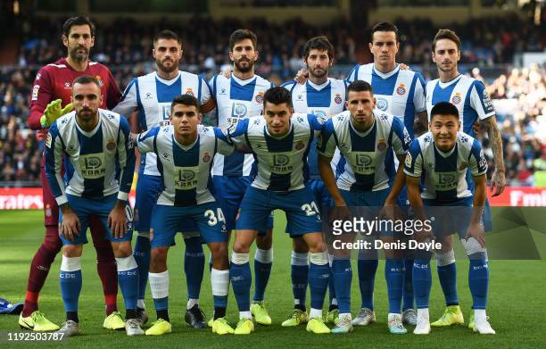 Espanyol players line-up for a group photograph before the start of the Liga match between Real Madrid CF and RCD Espanyol at Estadio Santiago...