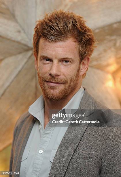 Tom Aikens attends a party for Dolce And Gabbana hosted by Net-a-Porter at Westfield on July 14, 2011 in London, England.