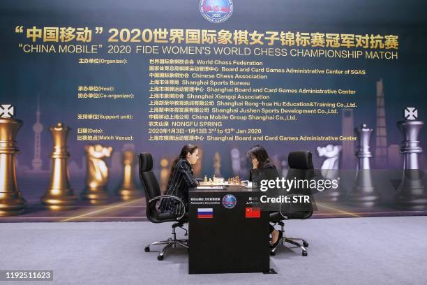 This photo taken on January 5, 2020 shows Ju Wenjun of China competing against Aleksandra Goryachkina of Russia during the 2020 International Chess...