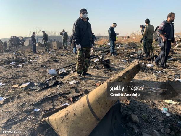 Search and rescue works are conducted at site after a Boeing 737 plane belonging to a Ukrainian airline crashed near Imam Khomeini Airport in Iran...
