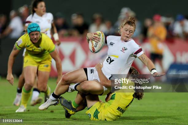 Alev Kelter of USA is tackled by Georgia Hannaway of Australia during the Women's Bronze Medal Final match between USA and Australia on Day Three of...