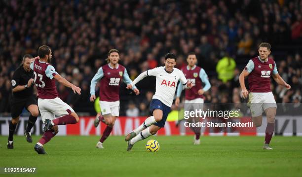 Heung-Min Son of Tottenham Hotspur breaks to score his team's third goal during the Premier League match between Tottenham Hotspur and Burnley FC at...