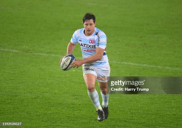 Henry Chavancy of Racing 92 runs with the ball during the Heineken Champions Cup Round 3 match between Ospreys and Racing 92 at Liberty Stadium on...