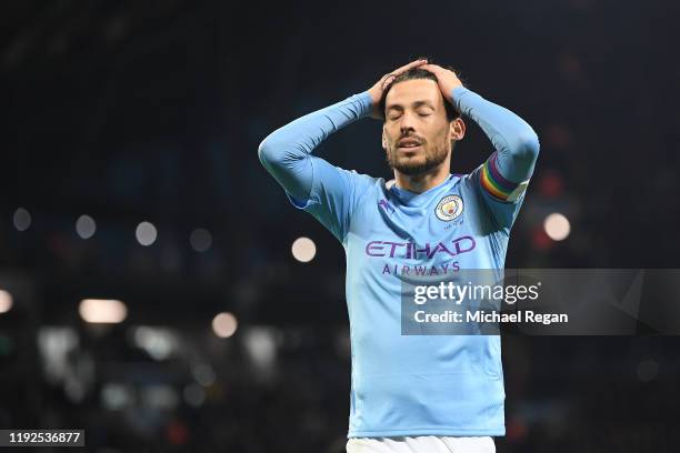 David Silva of Manchester City looks dejected during the Premier League match between Manchester City and Manchester United at Etihad Stadium on...