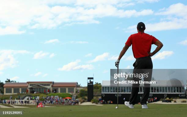 Tiger Woods of the United States waits to hit his approach shot on the 18th hole during the final round of the Hero World Challenge at Albany on...