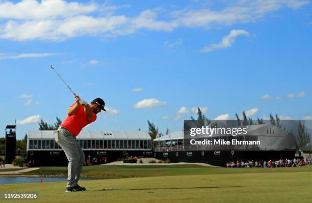 Jon Rahm of Spain hits is approach shot on the 18th hole during the final round of the Hero World Challenge at Albany on December 07, 2019 in Nassau,...