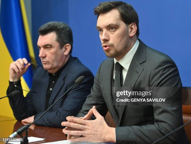 Prime Minister of Ukraine Oleksiy Honcharuk and Secretary of the National Security and Defense Council of Ukraine Oleksiy Danilov attend a briefing...