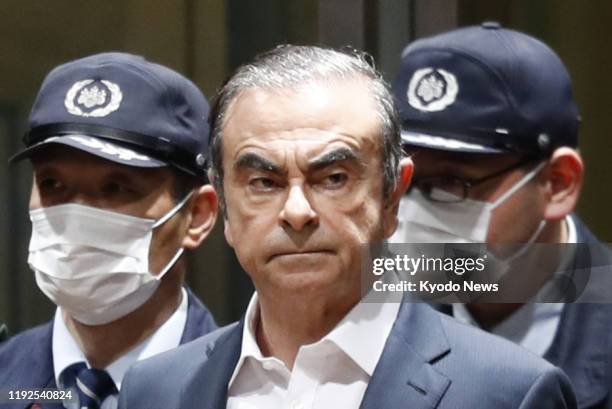 File photo taken April 25 shows former Nissan Motor Co. Chairman Carlos Ghosn being released from the Tokyo Detention House on bail for a second...