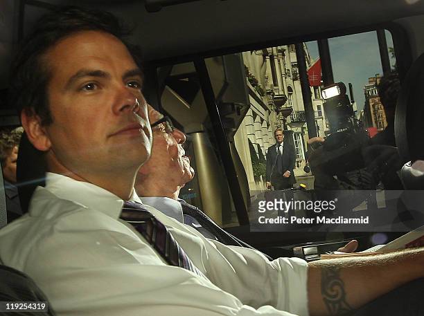 Lachlan Murdoch sits next to his father Rupert Murdoch as they leave home on July 15, 2011 in London, England. News International Chief Executive...