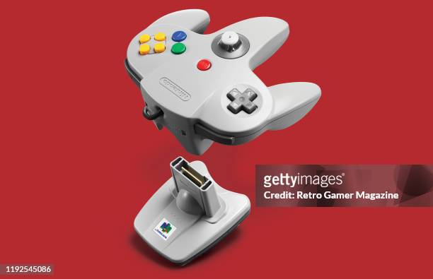 Nintendo 64 controller and Transfer Pak, taken on May 24, 2019.