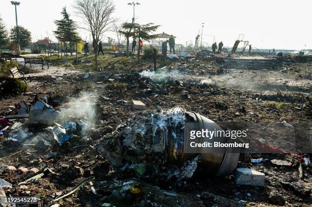 Aircraft parts from the wreckage of a Boeing Co. 737-800 aircraft, operated by Ukraine International Airlines, which crashed shortly after takeoff...