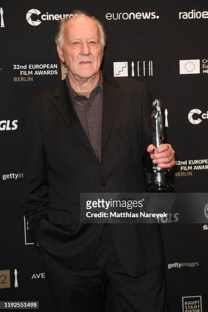 Werner Herzog poses with his Lifetime Achievement award at the 32nd European Film Awards at Haus Der Berliner Festspiele on December 07, 2019 in...