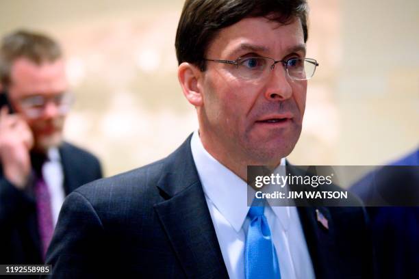 Defense Secretary Mark Esper leaves the Congressional Auditorium on Capitol Hill in Washington, DC, on January 8 after a closed briefing on the...