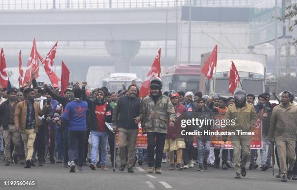 Police personnel seen during a protest by members of Centre of Indian Trade Unions on 24-hour Bharat Bandh called by different trade unions against...