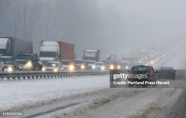 Northbound traffic on I-95 is at a standstill following a tractor trailer that jack-knived in the snowstorm.