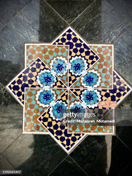tilework at haram complex and the imam reza shrine in mashhad, iran - arabesque stock pictures, royalty-free photos & images