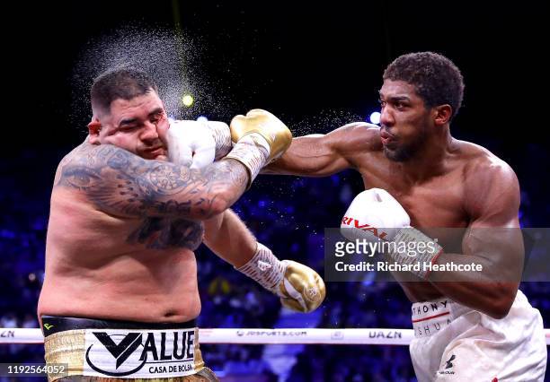 Anthony Joshua punches Andy Ruiz Jr during the IBF, WBA, WBO & IBO World Heavyweight Title Fight between Andy Ruiz Jr and Anthony Joshua during the...