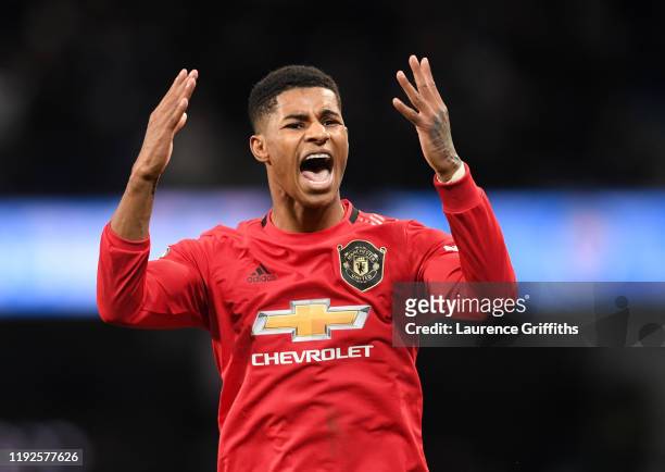 Marcus Rashford of Manchester United celebrates victory after the Premier League match between Manchester City and Manchester United at Etihad...