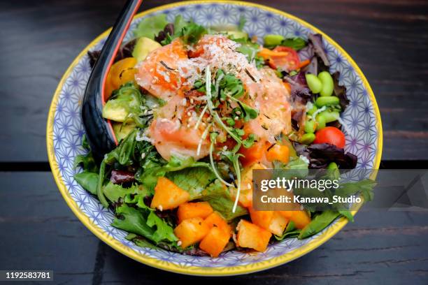 healthy salmon avocado salad bowl - raw food diet stock pictures, royalty-free photos & images