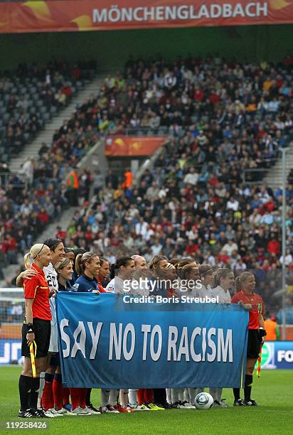 The teams of France and USA line up prior to the FIFA Women's World Cup 2011 Semi Final Match between France and USA at Stadion im Borussiapark on...